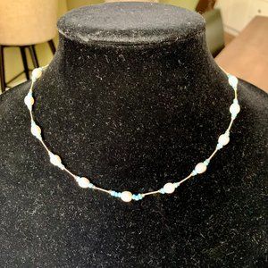 Hand-knotted pearl necklace